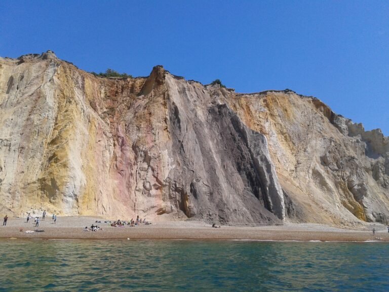 Swim at Alum Bay Beach IoW Wikimedia 1 768x576